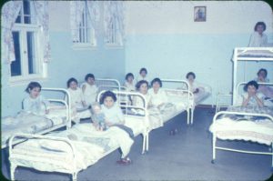 Junior girls' dormitory, Birtle School, c. 1960s (G-1-sc-13)