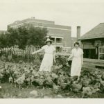 Staff members feeding the chickens, Birtle School, c.1934 (G-3818-fc-8)