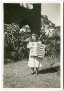 G-6154-FC Lillian with her accordian on lawn - Intro to Lillian